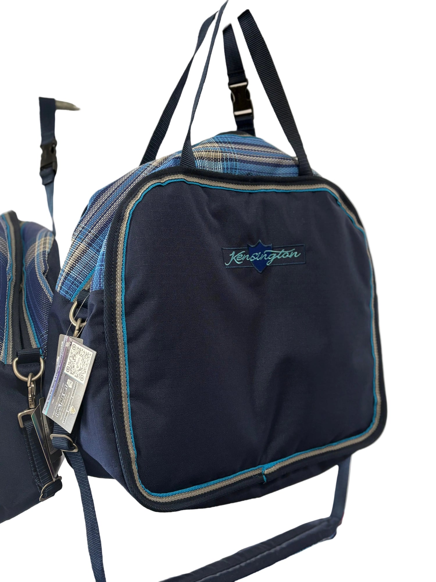 Black Kensington branded luggage with blue plaid accents.