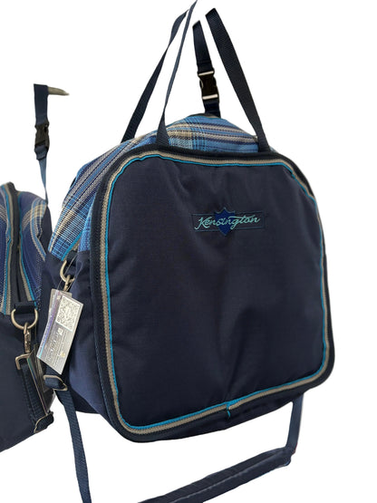 Black Kensington branded luggage with blue plaid accents.