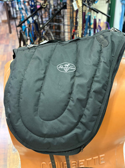 Black padded saddle carrier with Professional's Choice logo.