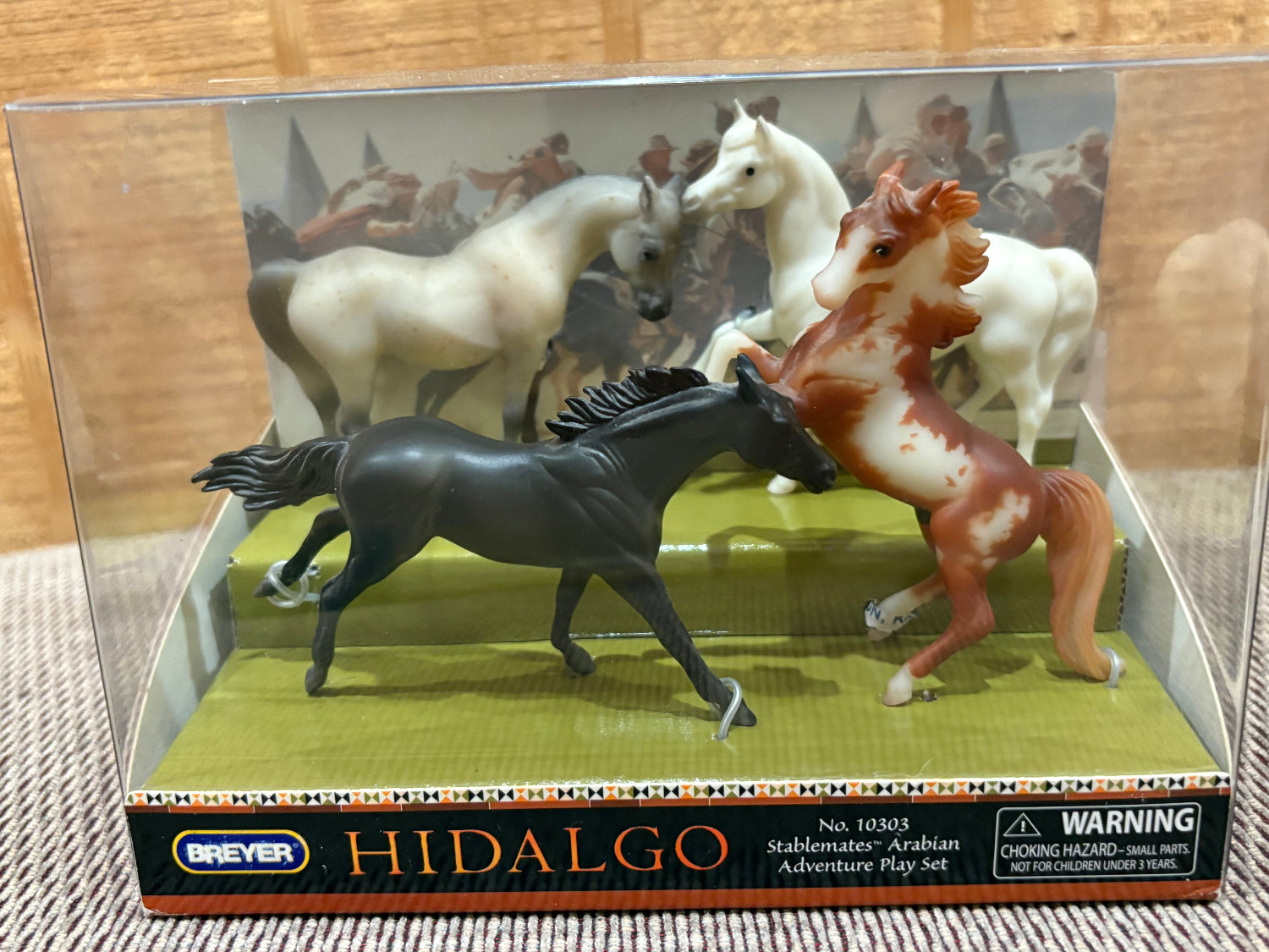 Breyer Hidalgo Arabian Adventure Play Set toy horses in a clear plastic display box, featuring 4 horses in their original package with printed backdrop inside.