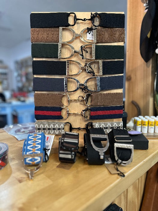 Variety of equestrian, elastic belts in color is black, brown green, navy, navy and red, gray and red blue, yellow and white.
