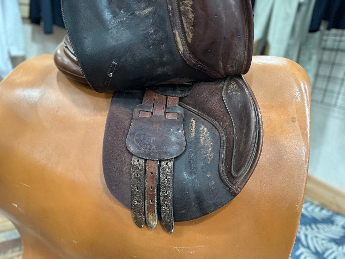 view of under right side of English riding saddle sitting on saddle model 