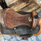 Top view of a western saddle.  Seat is a lighter color leather than the fenders.