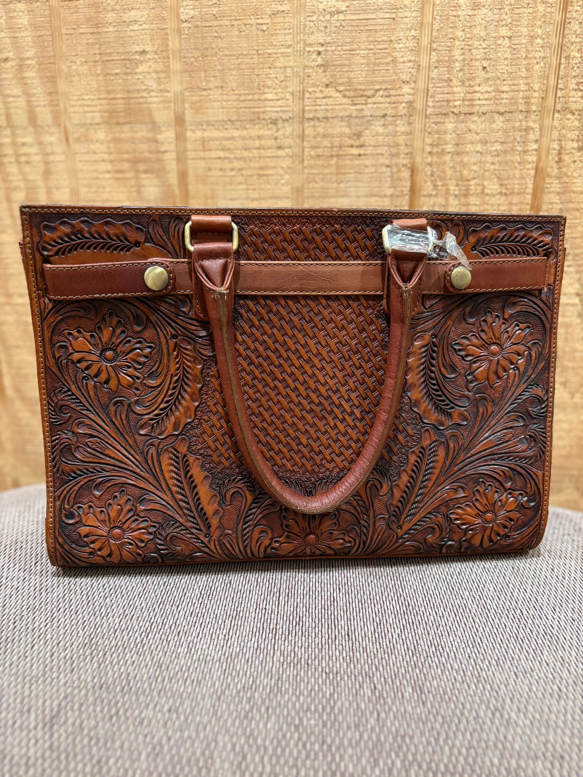 Brown tooled  leather ladies handbag with short handles