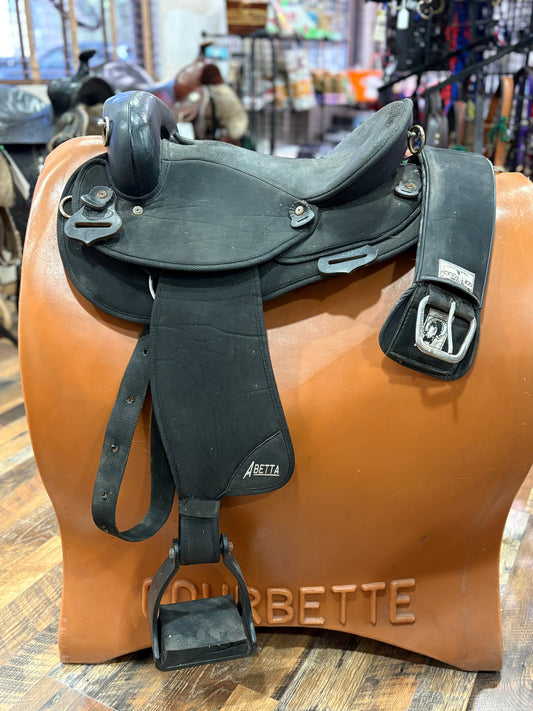 Black Abetta endurance saddle shown with black cinch and stirrups
