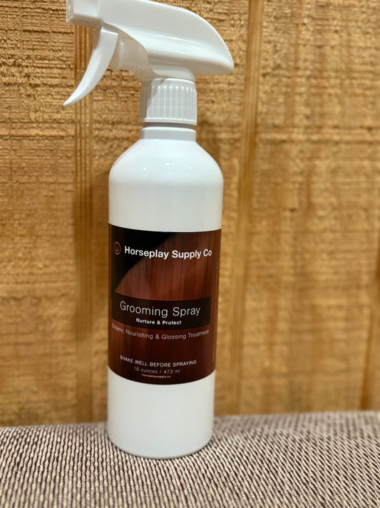 Spray bottle of grooming spray