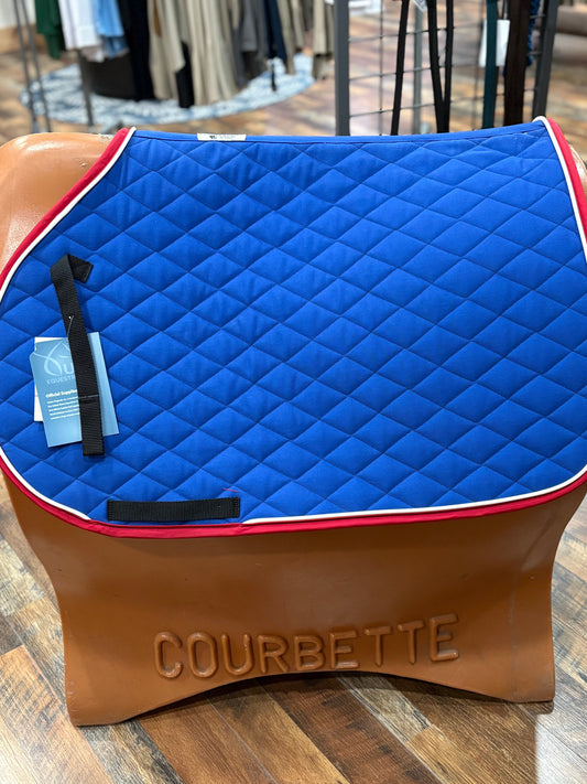 Blue saddle pad with red and white trim