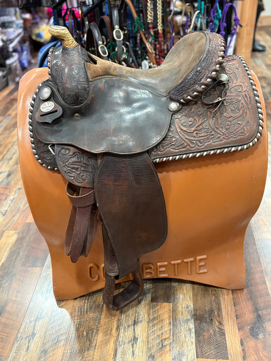Brown tooled leather western saddle