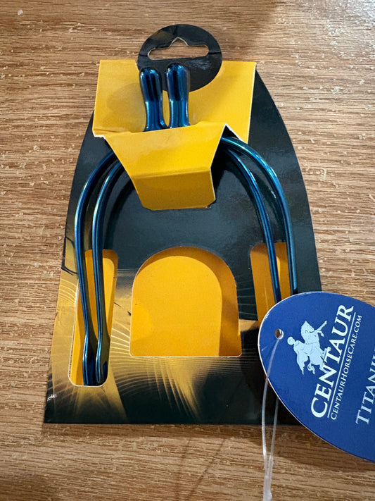 shiny blue spurs in gold and black package