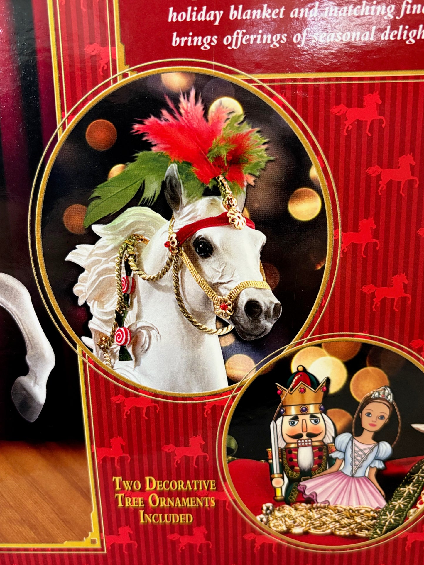 Details of Nutcracker Prince packaging showing two decorative ornaments included.