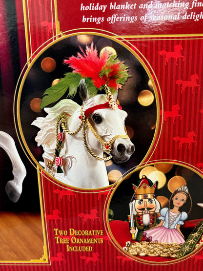 Details of Nutcracker Prince packaging showing two decorative ornaments included.