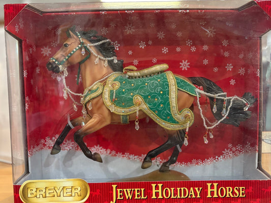 Breyer Jewel Holiday Horse in packaging with a red background