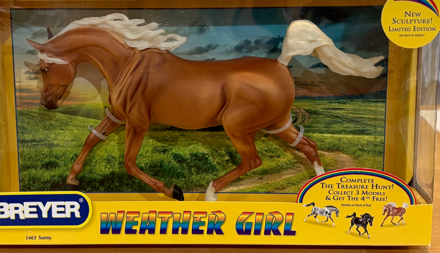Breyer Palomino Weather Girl model horse in packaging with scenic background