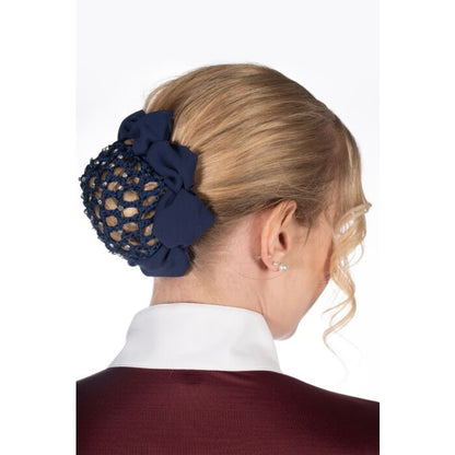 Back of lady's head with a low bun covered in a deep blue hairnet with crystals.