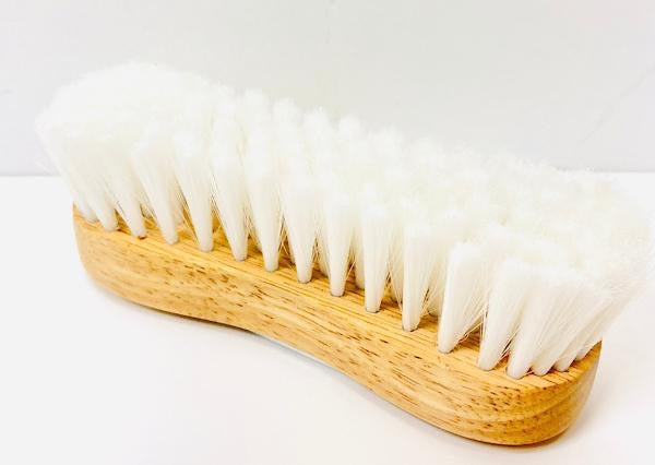 wood back grooming brush with white bristles