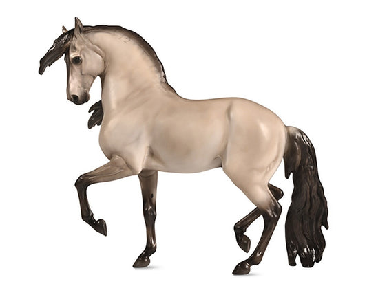 Model horse of a Lusitano breed.  Dun colored.  Regal looking with left front and right rear feet lifted