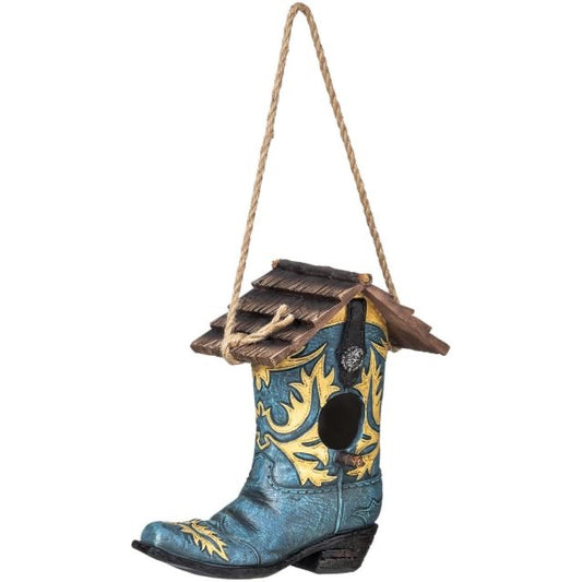 Birdhouse that looks like a fancy blue cowboy boot with a thatched roof