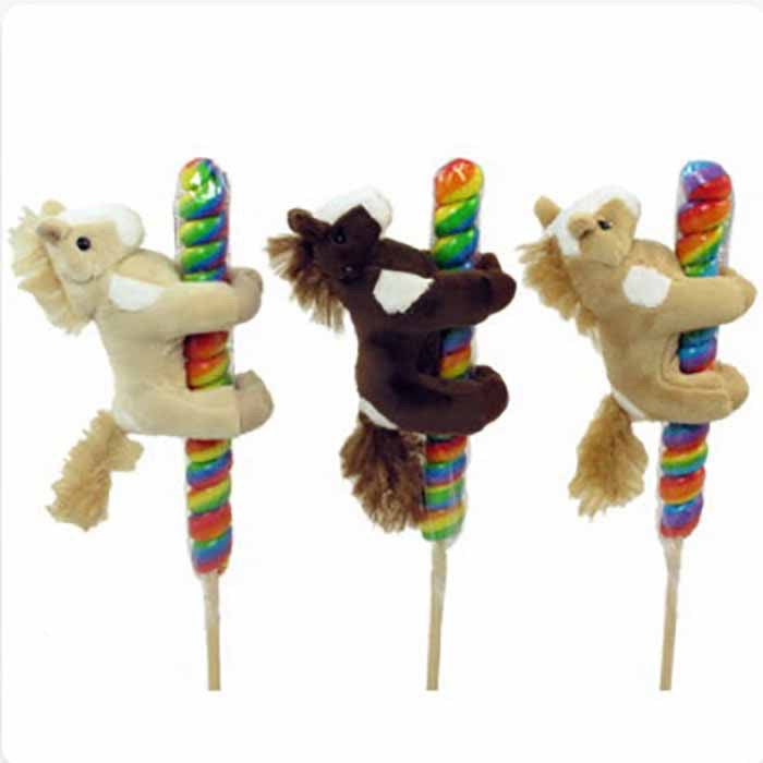 Three plush horses each hugging a twisted lollipop