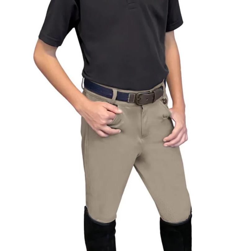 torso and legs of a young boy wearing tan equestrian riding pants with dark belt and shirt