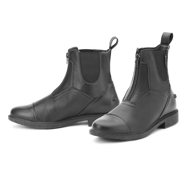 a black pair of equestrian riding paddock boots with front zipper