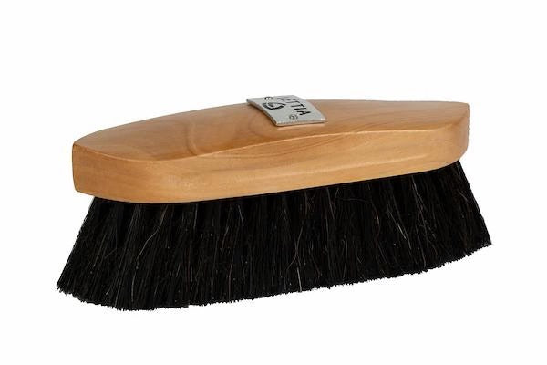 Wood back brush with dark bristles for grooming horses