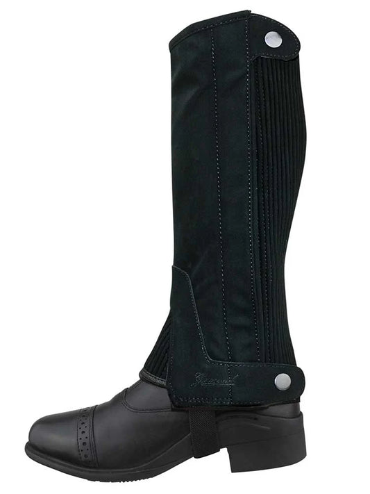 Black equestrian half chap shown with paddock boot