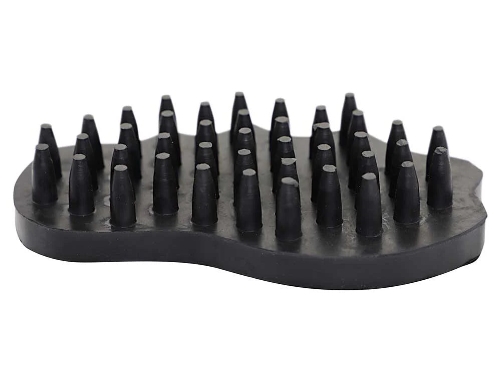 Black grooming brush with raised rubber blocks on a white background
