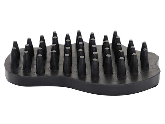 Black grooming brush with raised rubber blocks on a white background