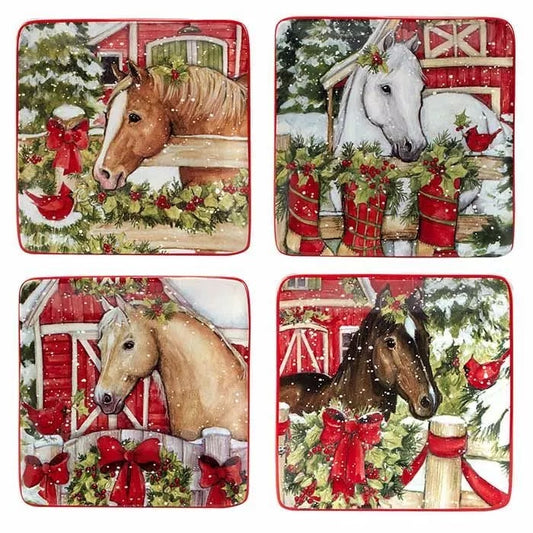 Four square plates each with a different horse in a snowy barn Christmasy look