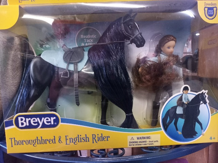 Breyer black horse and english rider set with light blue saddle pad