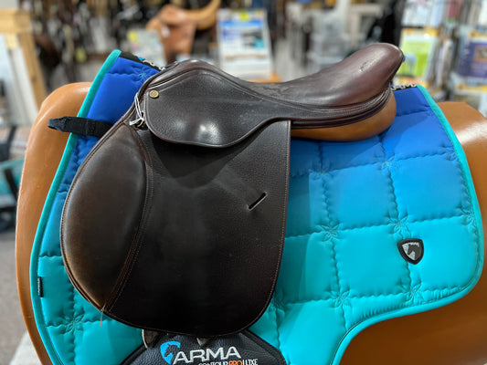 Dark brown leather english close contact saddle with knee rolls