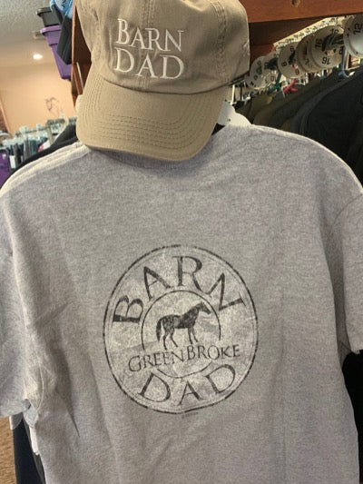 Barn Dad cap is tan with creme colored embroidered words.  Also showing the grey "Barn Dad.  Green Broke." shirt.