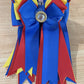 Pretty blue, red and yellow ribbon equestrian show bows