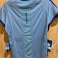Light blue scoop neck short sleeve shirt with darker blue trim. Shows Romfh logo.