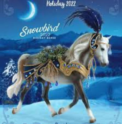 2022 holiday horse, very decorated with blue jewels and gold attire
